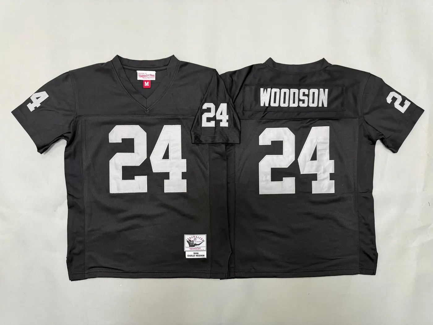 OAKLAND RAIDERS CHARLES WOODSON BLACK THROWBACK JERSEY